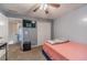 Bedroom with desk, TV, closet and gray walls at 2056 Plantation Rd, Lawrenceville, GA 30044