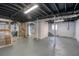 Spacious unfinished basement featuring exposed ductwork and support beams at 2279 Hickory Grove Nw Rd, Acworth, GA 30101