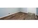 This bedroom features modern wood flooring and neutral paint at 2279 Hickory Grove Nw Rd, Acworth, GA 30101