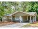 Charming single-story home with a covered carport and a well-maintained front yard at 2279 Hickory Grove Nw Rd, Acworth, GA 30101