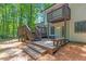 Multi-level deck with built-in seating, offering ample space for outdoor gatherings and enjoying the serene backyard at 630 Pennylake Ct, Stone Mountain, GA 30087