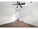 This bedroom offers hardwood floors and white walls with two doors leading to other rooms at 630 Pennylake Ct, Stone Mountain, GA 30087