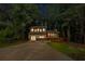 Charming two-story home with a well-maintained lawn, a covered porch, and a paved driveway at 630 Pennylake Ct, Stone Mountain, GA 30087
