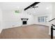Spacious living room featuring a modern fireplace and beautiful hardwood floors at 630 Pennylake Ct, Stone Mountain, GA 30087