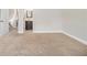 Neutral bedroom with carpet and trim, and view to the hall bathroom at 7691 Brazos Trl, Fairburn, GA 30213