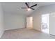 Spacious main bedroom features vaulted ceiling, neutral carpet, and natural light at 1790 Abinger Ln, Lawrenceville, GA 30043