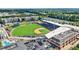 Aerial view of the Truist Point stadium baseball field, seating, and surrounding buildings on a clear day at 3059 Brookgreen Trl, Lawrenceville, GA 30043