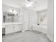 Bright bathroom features a soaking tub, double vanity, and abundant natural light at 3059 Brookgreen Trl, Lawrenceville, GA 30043
