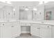 Bright bathroom features a double vanity, make up table, and modern finishes at 3059 Brookgreen Trl, Lawrenceville, GA 30043