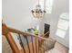 Bright foyer features a chandelier, staircase, and an abundance of natural light at 3059 Brookgreen Trl, Lawrenceville, GA 30043