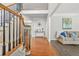 Inviting foyer with hardwood floors, staircase and light-colored walls create a bright, welcoming space at 3059 Brookgreen Trl, Lawrenceville, GA 30043