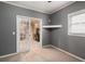 Office area featuring glass doors and neutral walls at 3059 Brookgreen Trl, Lawrenceville, GA 30043
