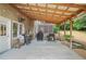 Covered patio with a ceiling fan and a grill at 3059 Brookgreen Trl, Lawrenceville, GA 30043