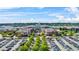 Aerial shot of the shopping mall with a large parking lot, trees, and a variety of retail stores at 3059 Brookgreen Trl, Lawrenceville, GA 30043