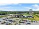 Aerial view of the Topgolf facility showing the driving range, building, and parking lot in a suburban setting at 3059 Brookgreen Trl, Lawrenceville, GA 30043