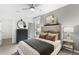 Relaxing bedroom featuring neutral walls, a ceiling fan, and bright natural light at 4317 Azalea Ridge Way, Hoschton, GA 30548