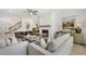Cozy living room with a white brick fireplace, shiplap accents, and comfortable seating arrangement at 4317 Azalea Ridge Way, Hoschton, GA 30548