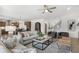 Spacious living room open to kitchen with modern furnishings and abundant natural light at 4317 Azalea Ridge Way, Hoschton, GA 30548