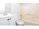 Bathroom featuring a vanity with a white basin, a closed toilet, and a tub with shower stall at 1997 Villa Rica Hwy, Dallas, GA 30157