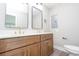 Modern bathroom featuring double sinks, wood vanity, and matte black hardware, offering a stylish and functional space at 1997 Villa Rica Hwy, Dallas, GA 30157