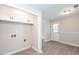 Laundry room with cabinets and hookups for washer and dryer at 1997 Villa Rica Hwy, Dallas, GA 30157