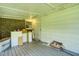 The screened porch is in need of TLC and is currently used for storage at 1997 Villa Rica Hwy, Dallas, GA 30157