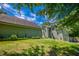 Expansive green backyard featuring a well-maintained lawn and surrounded by lush trees at 2680 Bay Ridge Dr, Loganville, GA 30052
