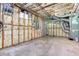 Unfinished basement with wooden framework, exposed pipes and concrete floor at 2680 Bay Ridge Dr, Loganville, GA 30052
