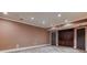 Spacious basement area with tile flooring, recessed lighting, and ample room for entertaining at 2680 Bay Ridge Dr, Loganville, GA 30052