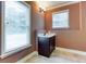 Bright bathroom with a large window, a vanity with storage and tiled flooring at 2680 Bay Ridge Dr, Loganville, GA 30052