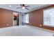 Bedroom featuring neutral carpeting, recessed lighting, and ceiling fan at 2680 Bay Ridge Dr, Loganville, GA 30052