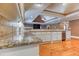 Kitchen with stone countertops, white cabinets, and stainless steel appliances at 2680 Bay Ridge Dr, Loganville, GA 30052