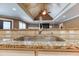 Close-up of a stainless steel sink and stone countertops in a kitchen at 2680 Bay Ridge Dr, Loganville, GA 30052