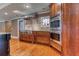 Modern kitchen with professional stainless steel appliances, granite counters, and a decorative window at 2680 Bay Ridge Dr, Loganville, GA 30052