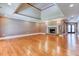 Spacious living room with a stone fireplace and recessed lighting at 2680 Bay Ridge Dr, Loganville, GA 30052