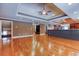 Large open-concept living space with hardwood floors, an open layout to the kitchen, and recessed lighting at 2680 Bay Ridge Dr, Loganville, GA 30052