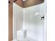 Shower stall featuring a built in seat and bronze shower head and faucet at 2680 Bay Ridge Dr, Loganville, GA 30052