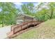 Two car detached garage with wood deck and ramp leading to the building at 3329 Walt Stephens Rd, Stockbridge, GA 30281
