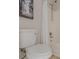 Bathroom features a white toilet and shower/tub combo with neutral tile at 3329 Walt Stephens Rd, Stockbridge, GA 30281