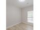 Bright bedroom features wood flooring and a large window with natural light at 3329 Walt Stephens Rd, Stockbridge, GA 30281