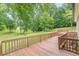 Spacious wooden deck overlooking the lush green lawn at 3329 Walt Stephens Rd, Stockbridge, GA 30281