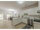 Spacious kitchen with white cabinets, stainless steel appliances, and a center island at 3329 Walt Stephens Rd, Stockbridge, GA 30281