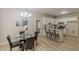 Bright eat-in kitchen with white cabinets, stainless appliances, and dining table at 3329 Walt Stephens Rd, Stockbridge, GA 30281