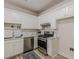 Updated kitchen with stainless steel appliances, ample counter space, and eat-in dining at 3329 Walt Stephens Rd, Stockbridge, GA 30281