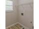 Laundry room with a window and wire shelving at 3329 Walt Stephens Rd, Stockbridge, GA 30281