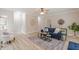 Open-concept living room with stylish furnishings, hardwood floors, and plenty of space at 3329 Walt Stephens Rd, Stockbridge, GA 30281