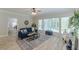 Bright and airy living room with ample natural light, modern decor, and stylish flooring at 3329 Walt Stephens Rd, Stockbridge, GA 30281