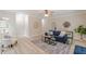 Open-concept living room with stylish decor, abundant natural light, and modern finishes at 3329 Walt Stephens Rd, Stockbridge, GA 30281