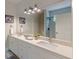 Bathroom with a double vanity and large mirror at 3329 Walt Stephens Rd, Stockbridge, GA 30281