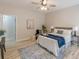 Bedroom with a ceiling fan and an ensuite bathroom at 3329 Walt Stephens Rd, Stockbridge, GA 30281